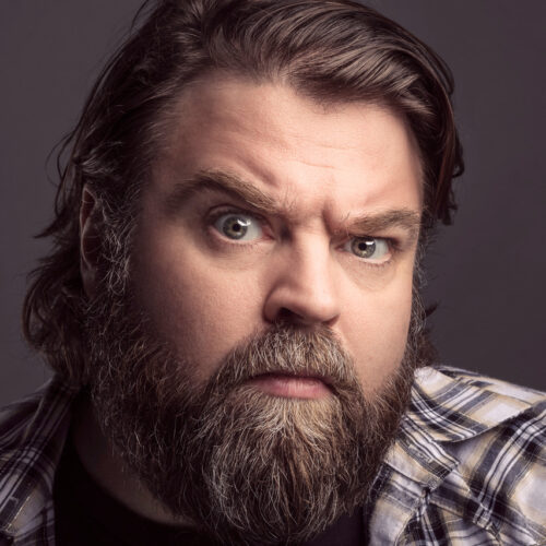 A headshot of Glenn Wool - a white male with a bushy beard.