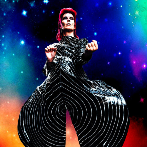 Promotional artwork showing a performer in a striking black costume with white concentric stripe patterns and bright red hair, posed against a vivid cosmic backdrop featuring stars and colourful blue, green, purple and orange clouds.